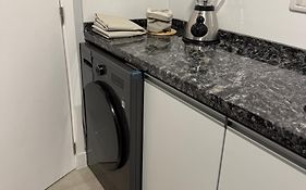 DEPARTAMENTO NUEVO CENTRICO 1Dormitorio COCHERA GRATIS PISCINA